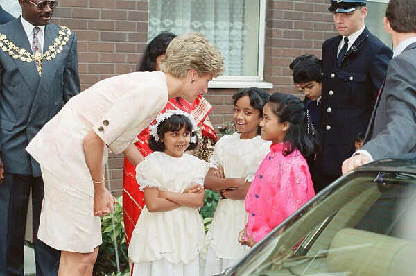 HRH The Princess of Wales, Princess Diana, tours the Guinness Estate in Mansell Street