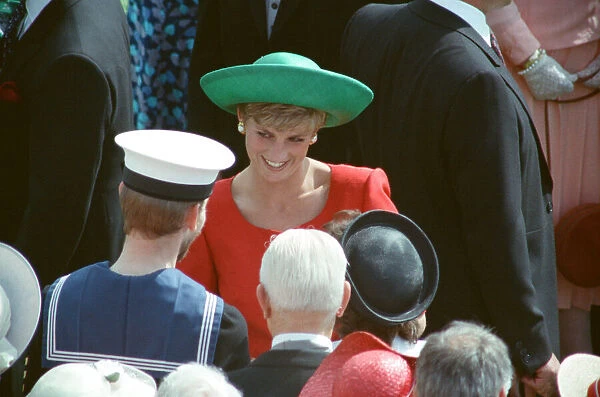 HRH The Princess of Wales, Princess Diana, meets the many well-wishers at The Buckingham