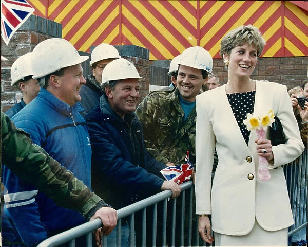 HRH The Princess of Wales, Princess Diana has a laugh with some local builders during her