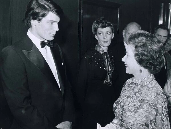 HRH Queen Elizabeth II meets actor Christopher Reeve following the film premiere of