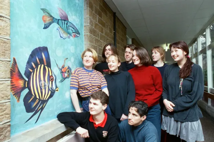 Framed Print : Huddersfield New College pupils are pictured by the mural they spent six months painting