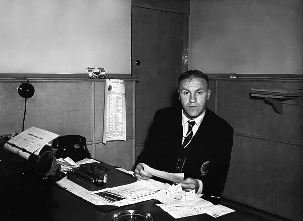 Huddersfield Town manager Bill Shankly in his office at the club. 30th April 1959