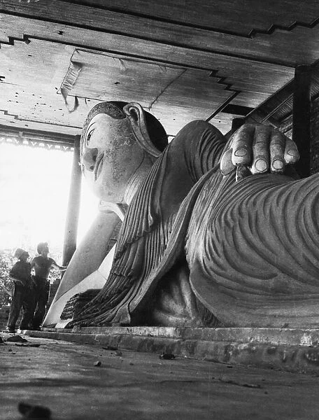 A huge Burmese image, 40 feet long and 30 feet high, found in one of the monasteries