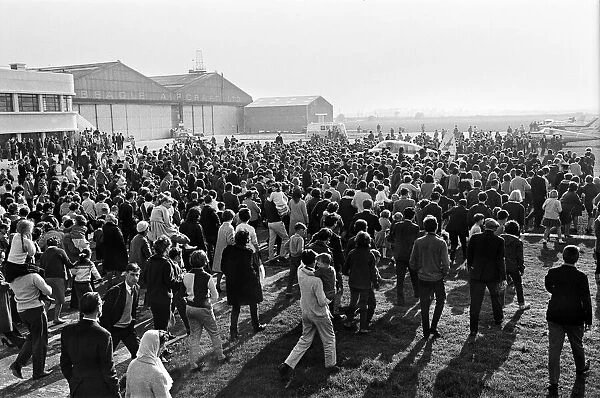 Huge crowds greet the arrival of Manchester pop group The Hollies at Shoreham airport