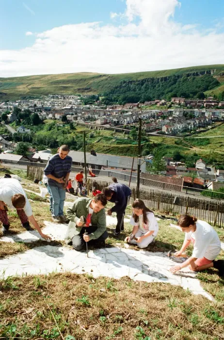 Framed Print : A huge Dragon made from recycled marble on the hillside in Blaenllechau Framed Print : A huge Dragon made from recycled marble on the hillside in Blaenllechau
