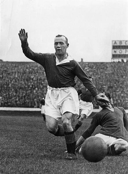 Hughie Gallacher in action for Chelsea during an English League Division One match