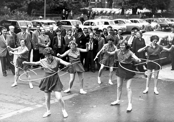 Hula-hooping - the latest craze to hit Britain had the girls a-swinging