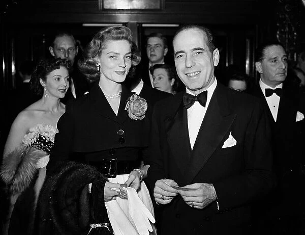 Humphrey Bogart with his wife Lauren Bacall at a film premiere April 1951