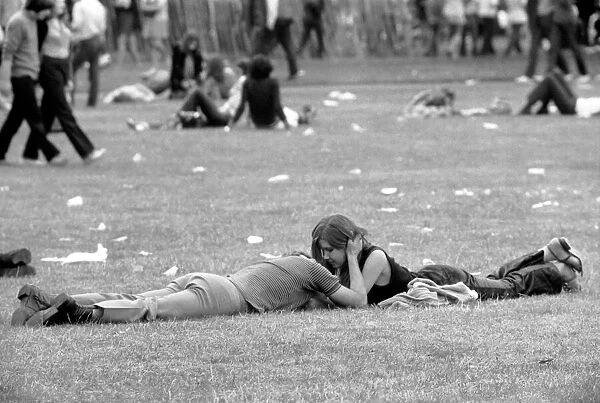 Hyde Park Pop Festival. A couple enjoying the open air and the music as well as each