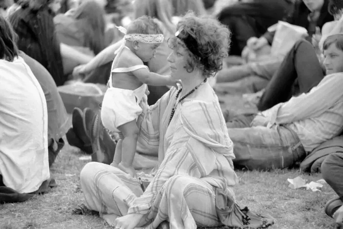 Framed Print : Hyde Park Pop Festival. Mother and child enjoy the sunshine on the grass Framed Print : Hyde Park Pop Festival. Mother and child enjoy the sunshine on the grass