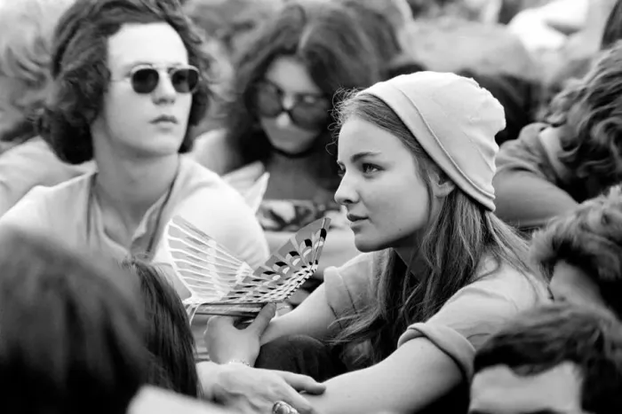 Framed Print : Hyde Park Pop Festival. A very pretty girl spotted in the crowd with a bird-like toy that