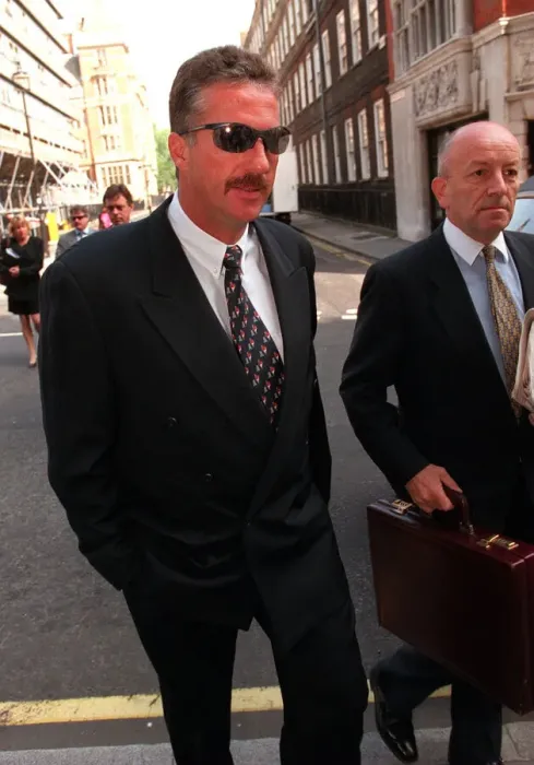 Framed Print : Ian Botham arrives with his lawer at the High Court for his libel case against Imran Khan