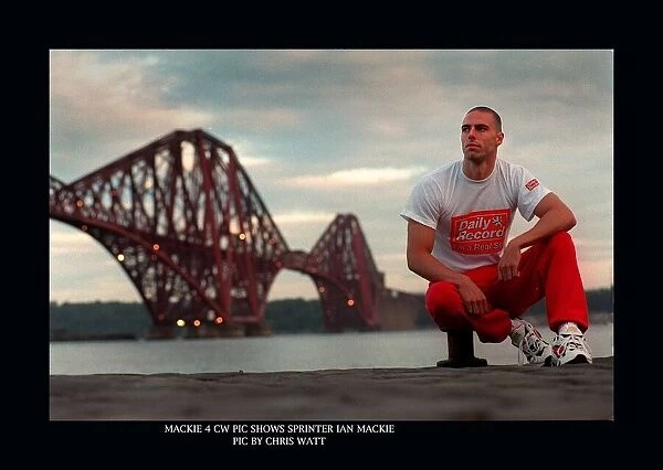 Ian Mackie Scottish 100 metres sprinter wearing a Daily Record T shirt with the Forth