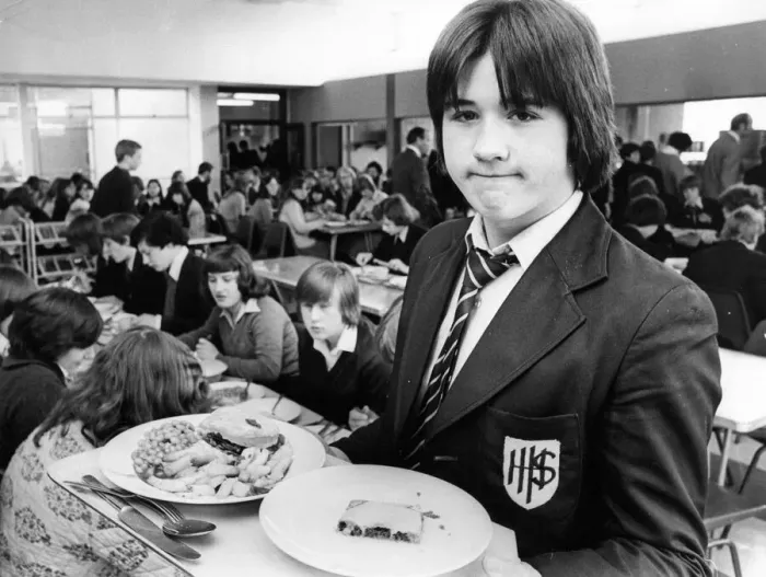 Framed Print : Ian Mullaney enjoys his school dinner in a crowded dining hall
