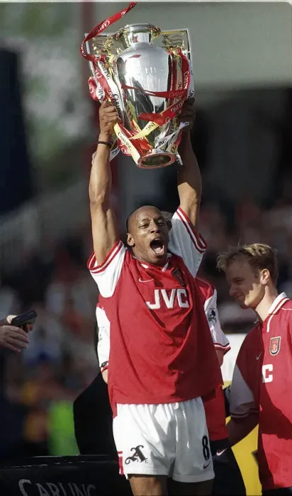 Framed Print : Ian Wright Arsenal celebrates after winning the May 1998 FA Carling Premiership title Framed Print : Ian Wright Arsenal celebrates after winning the May 1998 FA Carling Premiership title