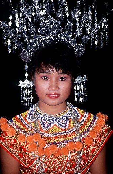 Iban Tribal Girl in traditional costume, Sarawak East Malaysia (Borneo) circa 1995