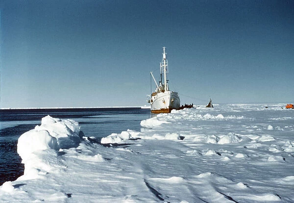 Ice Breaker tied up to the pack ice during the 1956 Trans-Antarctic Expedition