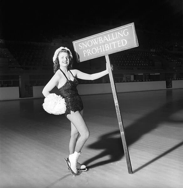 Ice skater with snow balling prohibited sign. 1959 E60