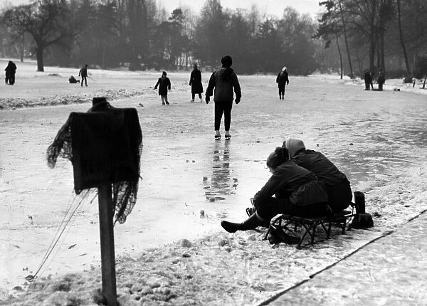 Ice Skating on frozen lake, Cannon Hill Park, Birmingham, England, 26th January 1963