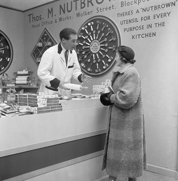 Ideal Home Exhibition Olympia. 3rd March 1955 Salesman from Thos M Nutbrown Limited