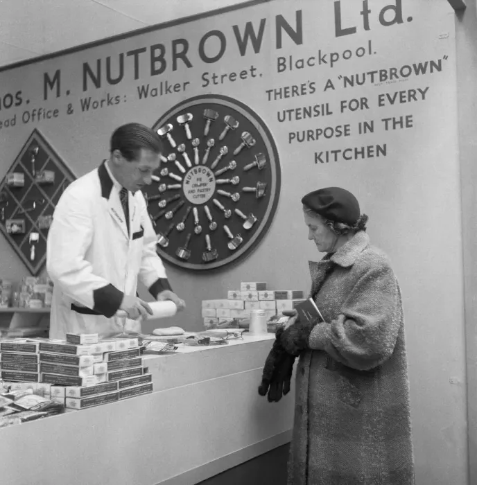 Framed Print : Ideal Home Exhibition Olympia. 3rd March 1955 Salesman from Thos M Nutbrown Limited Framed Print : Ideal Home Exhibition Olympia. 3rd March 1955 Salesman from Thos M Nutbrown Limited