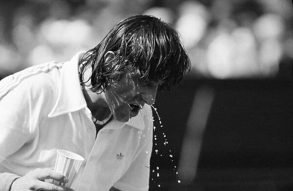 Ilie Nastase, Romanian Tennis Player, feels the heat at Wimbledon Tennis Championships