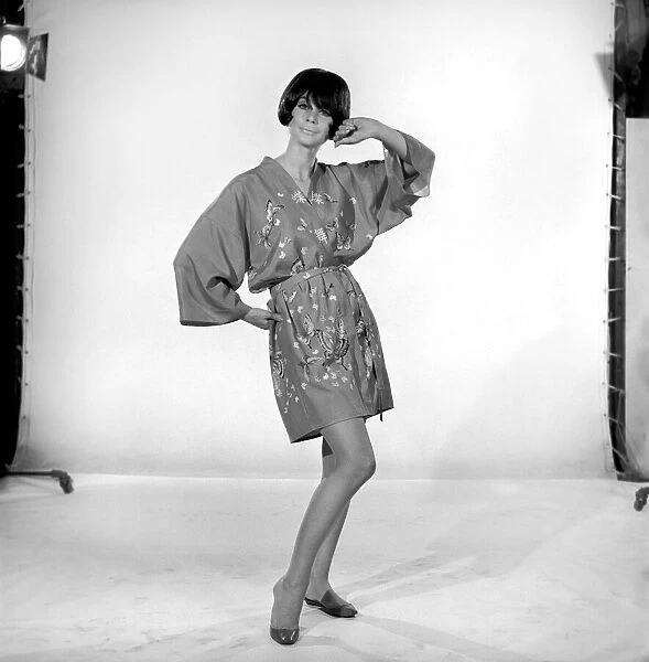 Imogen Woodford modelling a kimono outfit. 1965