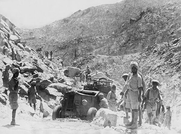 Indian army soldiers with an armoured car on the frontline at the Battle of Keren in