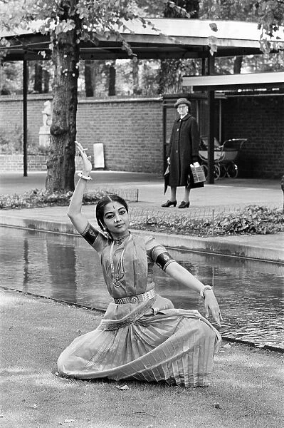 Indian Classical Dancers, London, 28th August 1965. Dancer holds a pose as elderly