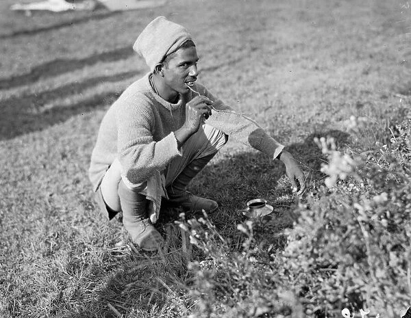 Indian soldier using a twig with the bark scraped off as a tooth brush