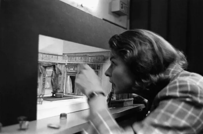 Framed Print : Ingrid Bergman is fascinated with the replicia of the stage set for the play she will be Framed Print : Ingrid Bergman is fascinated with the replicia of the stage set for the play she will be