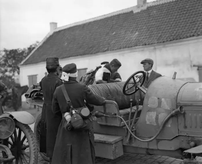 Framed Print : Injured Belgian soldiers seen here getting into a motor car prior to being transported Framed Print : Injured Belgian soldiers seen here getting into a motor car prior to being transported