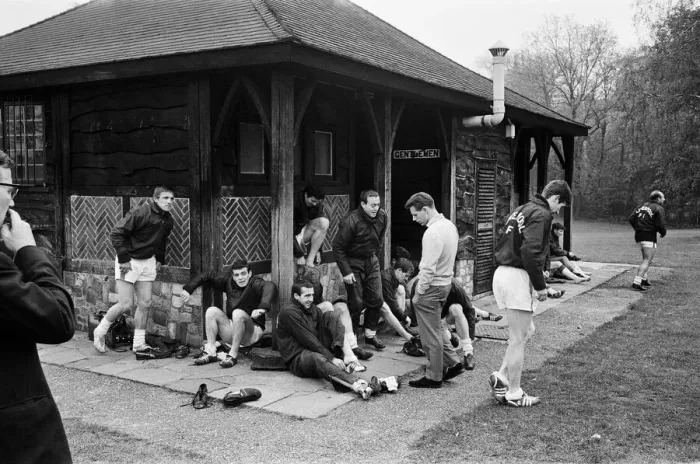 Framed Print : Injured Liverpool footballer Gordon Milne talking to his teammates as they take part in Framed Print : Injured Liverpool footballer Gordon Milne talking to his teammates as they take part in