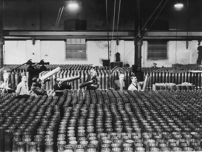 Framed Print : Inspectors check the quality of shells for naval guns in a munitions factory during WW2