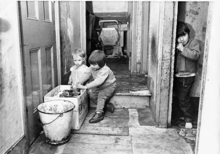 Framed Print : The Interior of slum housing in an area of Newcastle - Children finding anythig to play Framed Print : The Interior of slum housing in an area of Newcastle - Children finding anythig to play