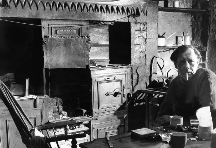 Framed Print : The Interior of slum housing in an area of Newcastle - Mr George Marshall sits in his Framed Print : The Interior of slum housing in an area of Newcastle - Mr George Marshall sits in his