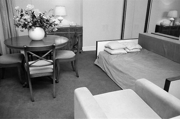 Interior view of a flat, showing the living room area and sofa bed. 29th October 1986
