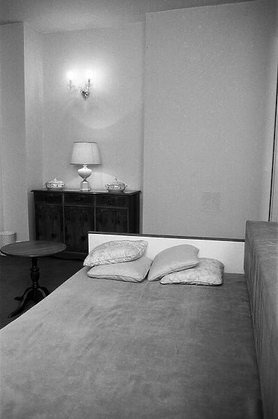 Interior view of a flat, showing the living room area and sofa bed. 29th October 1986