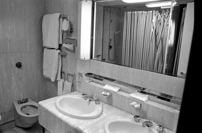 Framed Print : Interior view showing one of the cabin bathrooms aboard the luxury passenger liner QE2