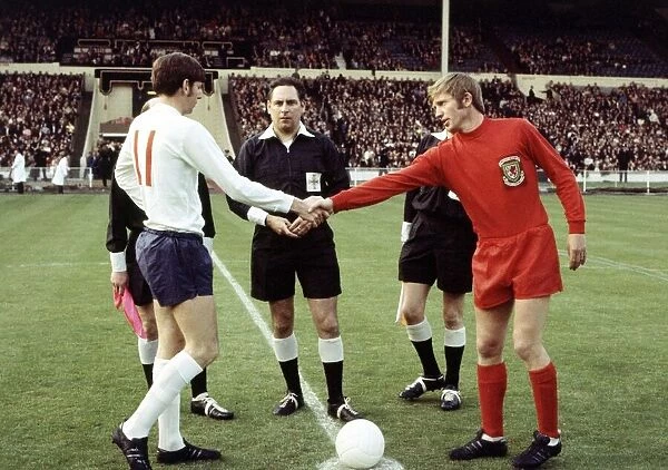 International Football England v Wales. Martin Peters and Alan Durban shake hands before