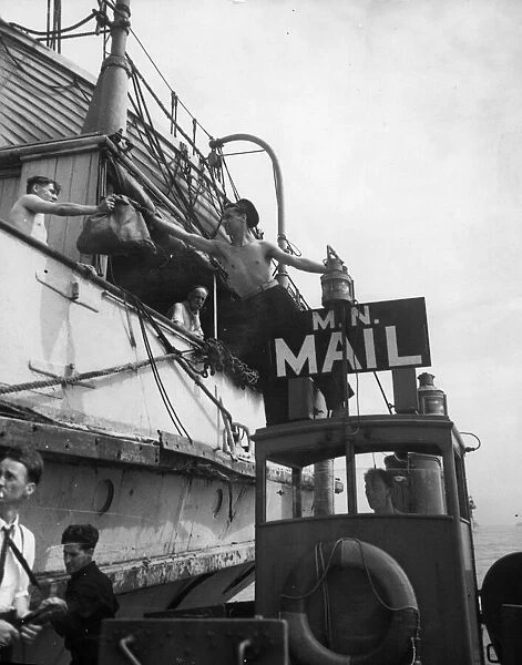 At this invasion port on the South Coast of England, Royal Navy postmen deliver 6000