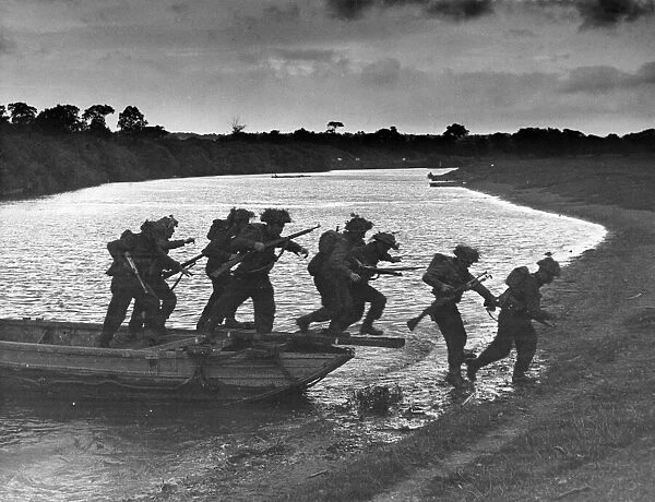 Invasion training in Southern England. Infantry are seen leaving a small assault boat