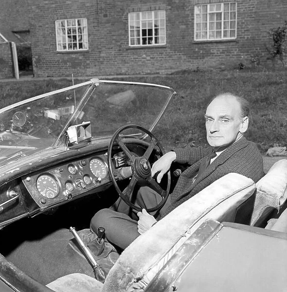 Inventor Jim Pickering seen here behind the wheel of his jaguar sports car which has been