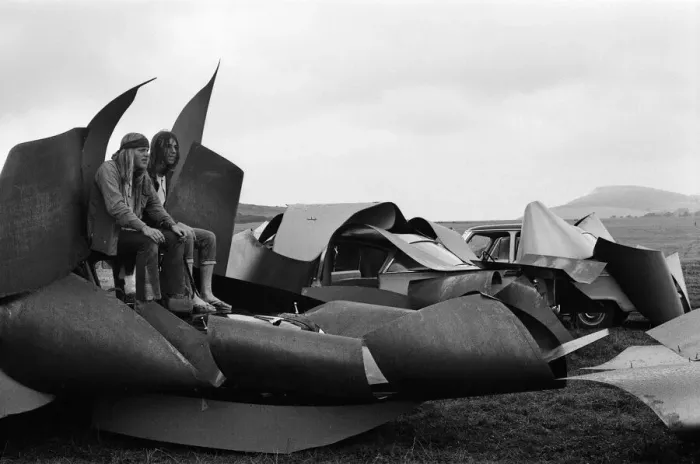 Framed Print : Isle of Wight Festival. Two Swedish hippy types sitting on top of cars that look like Framed Print : Isle of Wight Festival. Two Swedish hippy types sitting on top of cars that look like