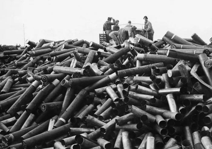 Framed Print : Italian civilians helping Allied soldiers unload empty shell cases at a dump on Anzio