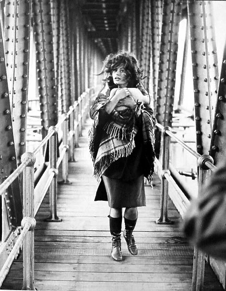 Italian film star Sophia Loren walks along the catwalk on the Crumlin Viaduct where she