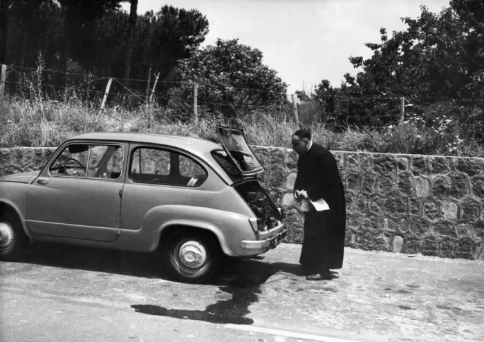 Framed Print : An Italian priest has trouble with his car on the Autostrada outside Naples Framed Print : An Italian priest has trouble with his car on the Autostrada outside Naples