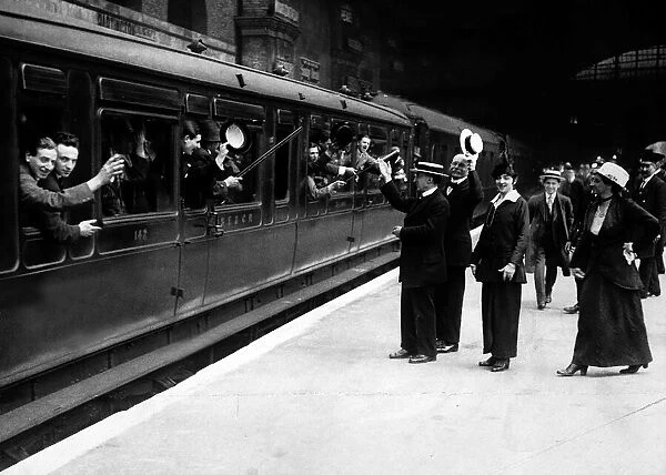 Italian soldiers leaving a London main line station bound for Dover