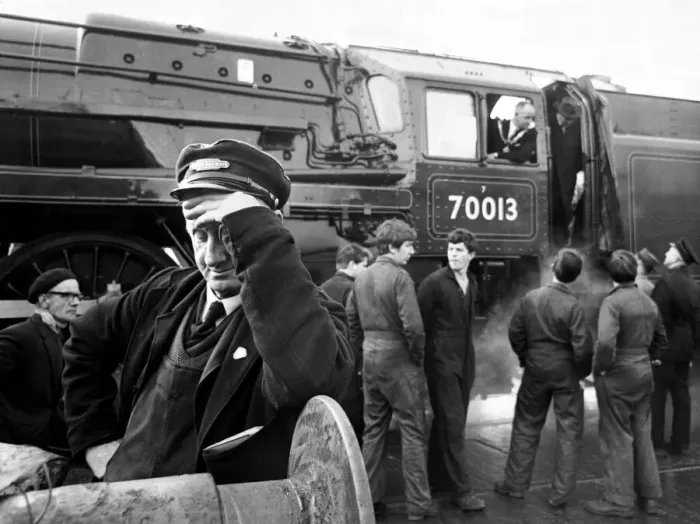 Framed Print : ItOs all too much for driver Charles Carter, as he turns away from watching the departure Framed Print : ItOs all too much for driver Charles Carter, as he turns away from watching the departure
