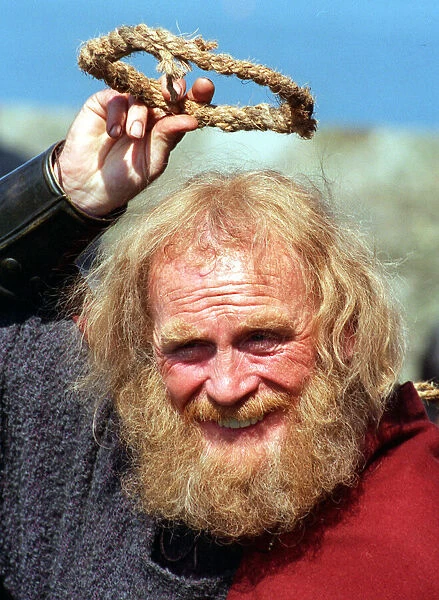 Ivanhoe Photo call at Blackness Castle James Cosmo who plays Cedric of Rotherwood holding